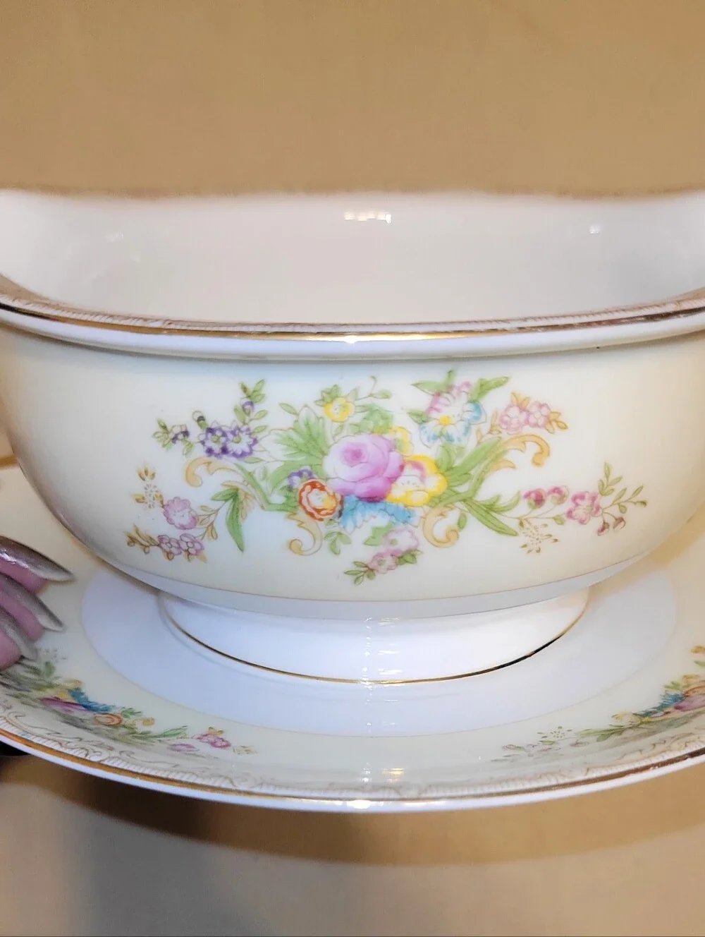 Mieto Porcelain Hand Painted Gravy Boat with Attached Saucer.